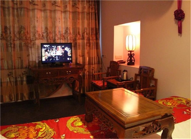 Imagen de la habitación del Hotel Pingyao Harmony. Foto 2