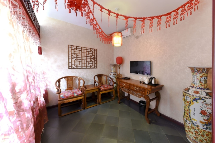 Imagen de la habitación del Hotel Pingyao Harmony. Foto 5