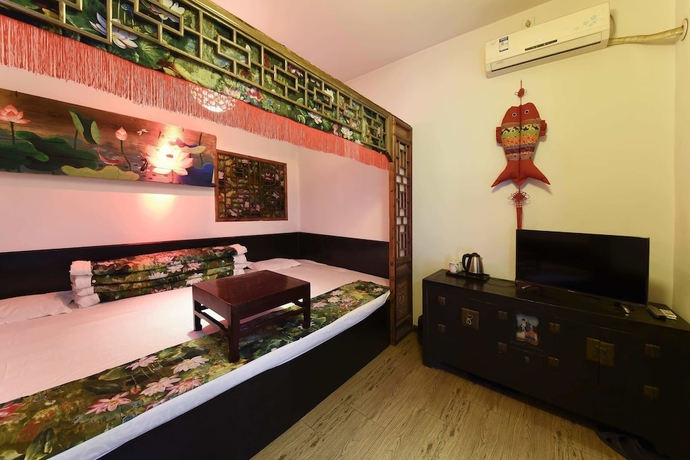 Imagen de la habitación del Hotel Pingyao Harmony. Foto 12