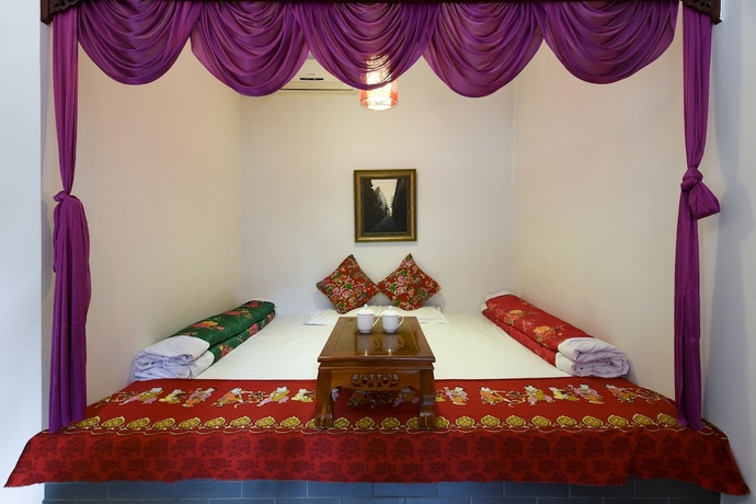 Imagen de la habitación del Hotel Pingyao Harmony. Foto 13