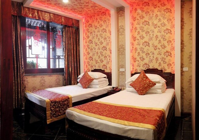 Imagen de la habitación del Hotel Pingyao Honghu Inn. Foto 22