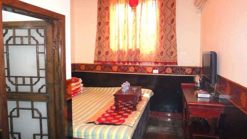 Imagen de la habitación del Hotel Pingyao Honghu Inn. Foto 24