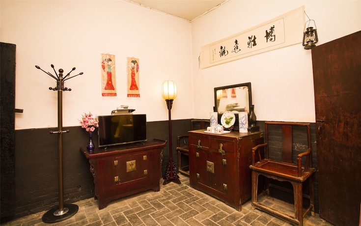 Imagen de la habitación del Hotel Pingyao Ji Family Courtyard Inn. Foto 10