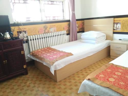 Imagen de la habitación del Hotel Pingyao Yan Family Homestay. Foto 2