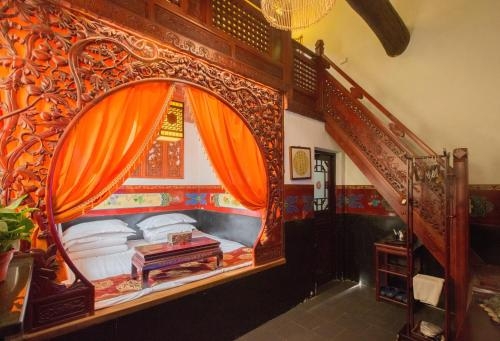 Imagen de la habitación del Hotel Pingyao Yiguan Folk Custom. Foto 10