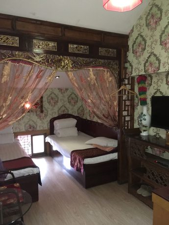 Imagen de la habitación del Hotel Pingyao Yuchengyuan. Foto 13