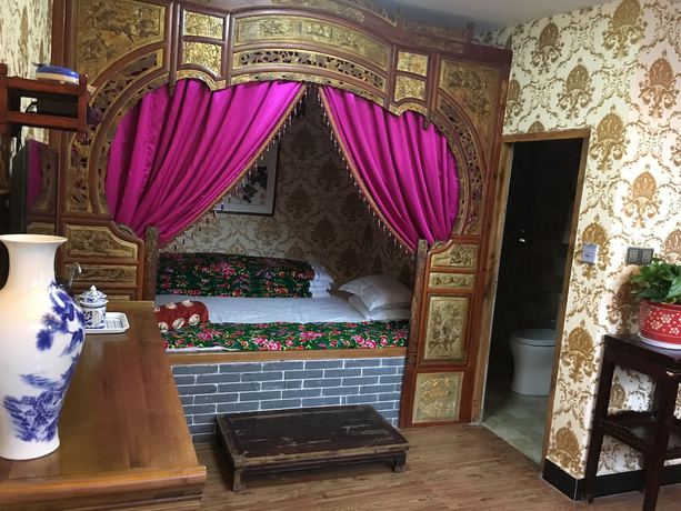 Imagen de la habitación del Hotel Pingyao Yuchengyuan. Foto 14