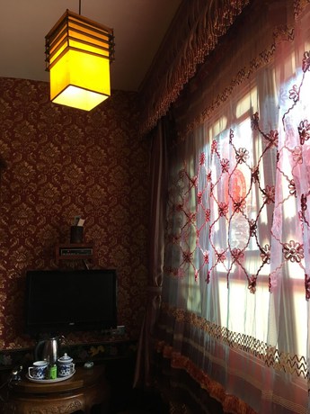 Imagen de la habitación del Hotel Pingyao Yuchengyuan. Foto 17