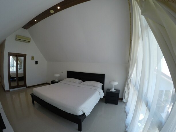 Imagen de la habitación del Hotel Pinjalo Resort Villas - Jade Hill Project Property Development. Foto 19