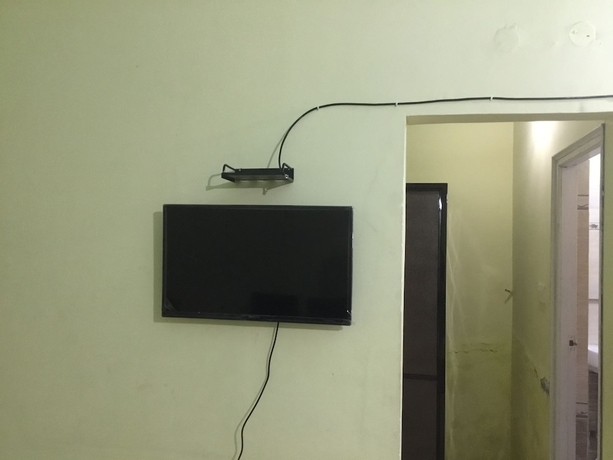 Imagen de la habitación del Hotel Pinjore Holiday Home. Foto 2