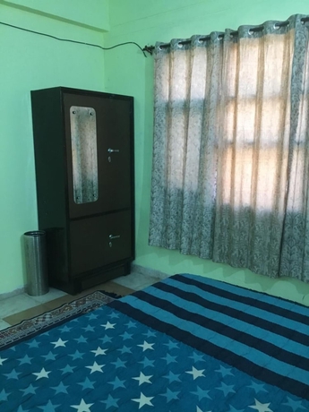 Imagen de la habitación del Hotel Pinjore Holiday Home. Foto 8