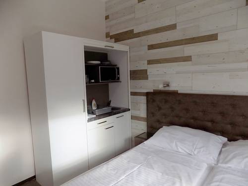 Imagen de la habitación del Hotel Pink House Apartments. Foto 7