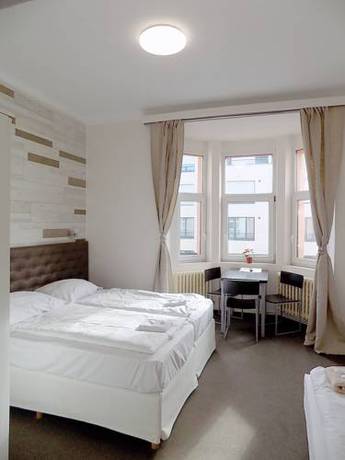 Imagen de la habitación del Hotel Pink House Apartments. Foto 8