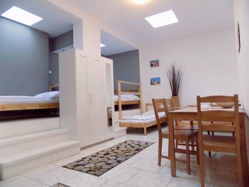 Imagen de la habitación del Hotel Pink House Apartments. Foto 9