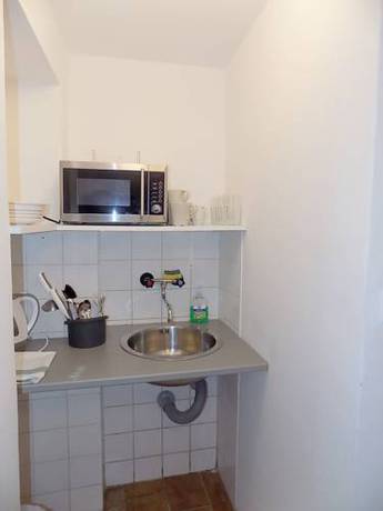 Imagen de la habitación del Hotel Pink House Apartments. Foto 12