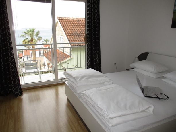 Imagen de la habitación del Hotel Pink Inn. Foto 6