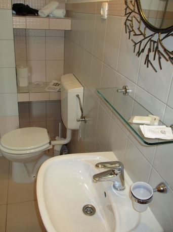 Imagen de la habitación del Hotel Pink Inn. Foto 8