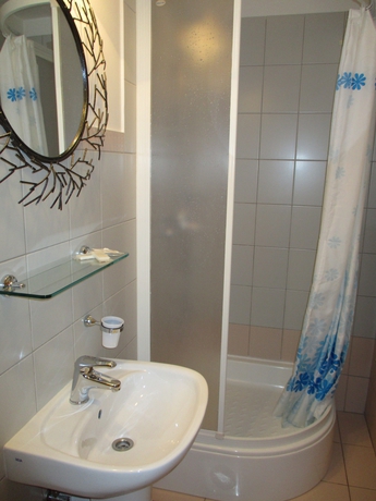 Imagen de la habitación del Hotel Pink Inn. Foto 10