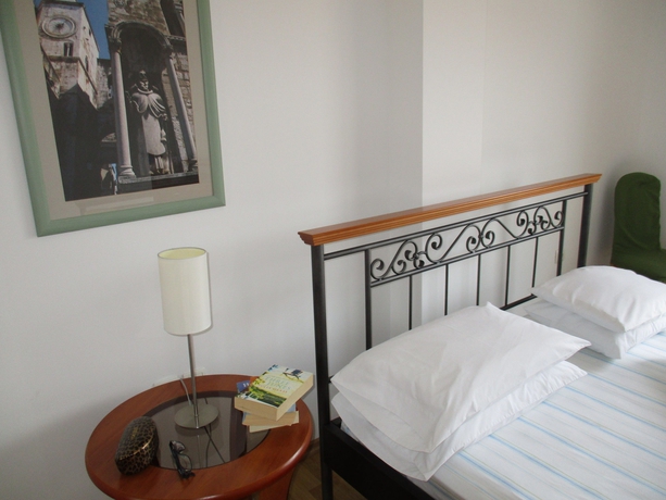 Imagen de la habitación del Hotel Pink Inn. Foto 11