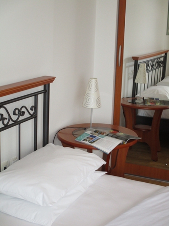 Imagen de la habitación del Hotel Pink Inn. Foto 12