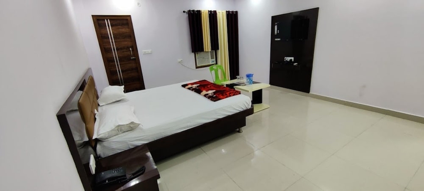 Imagen de la habitación del Hotel Pink Paradise Gorakhpur. Foto 3