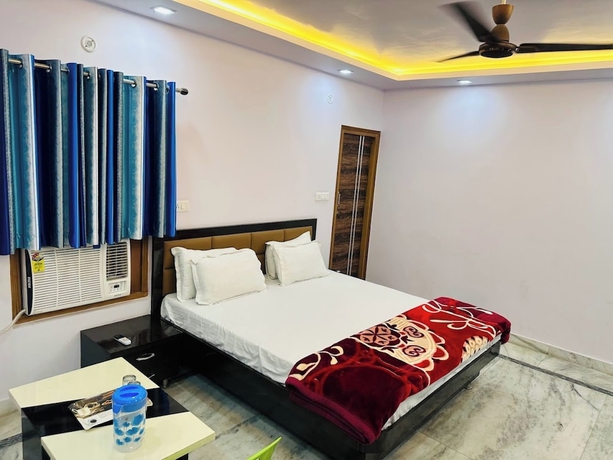Imagen de la habitación del Hotel Pink Paradise Gorakhpur. Foto 11
