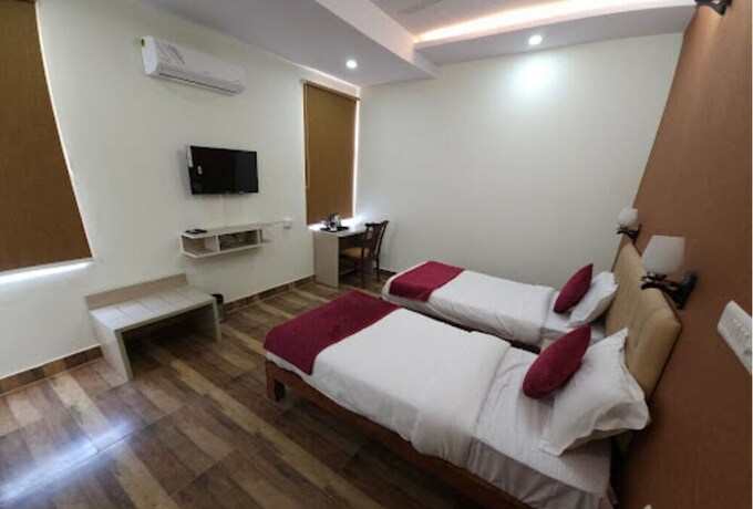 Imagen de la habitación del Hotel Pink Vista. Foto 7