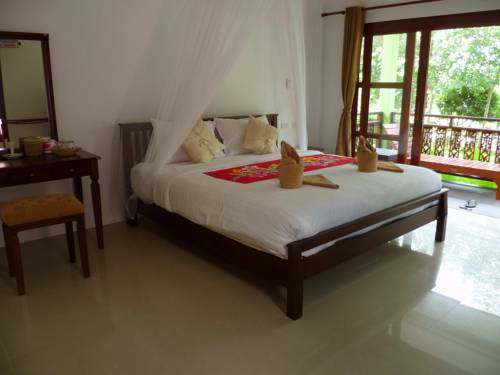 Imagen de la habitación del Hotel Pinky Bungalow Resort. Foto 3
