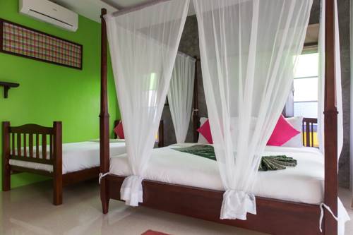 Imagen de la habitación del Hotel Pinky Bungalow Resort. Foto 7