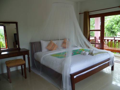 Imagen de la habitación del Hotel Pinky Bungalow Resort. Foto 13
