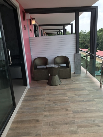 Imagen de la habitación del Hotel Pinky Bungalows Resort. Foto 7