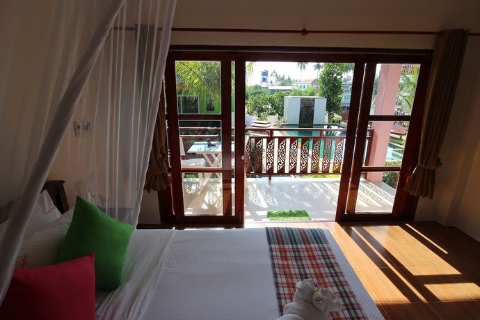 Imagen de la habitación del Hotel Pinky Bungalows Resort. Foto 9
