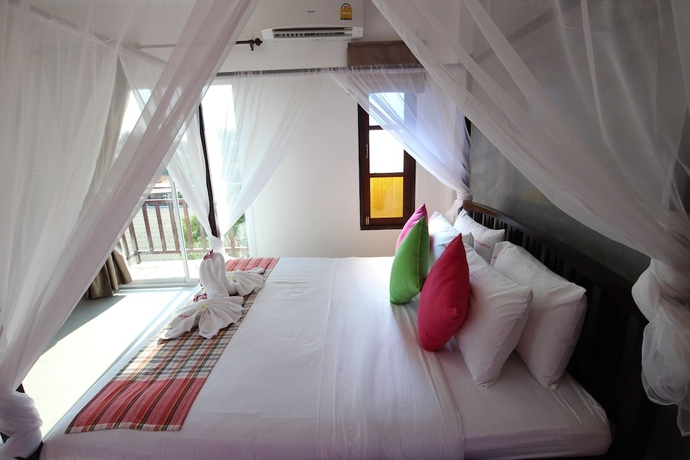 Imagen de la habitación del Hotel Pinky Bungalows Resort. Foto 10