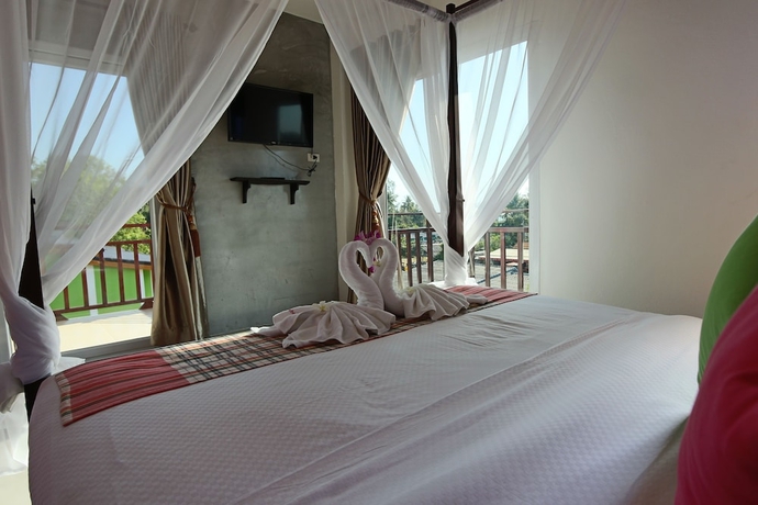 Imagen de la habitación del Hotel Pinky Bungalows Resort. Foto 13