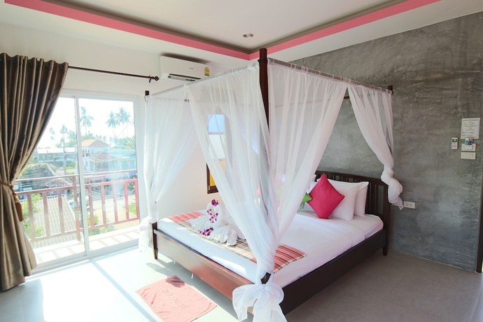 Imagen de la habitación del Hotel Pinky Bungalows Resort. Foto 14