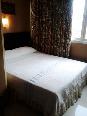 Imagen de la habitación del Hotel Pinnacle Dream. Foto 8