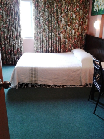 Imagen de la habitación del Hotel Pinnacle Dream. Foto 9