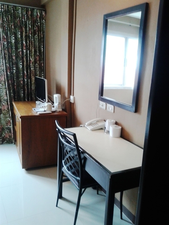 Imagen de la habitación del Hotel Pinnacle Dream. Foto 10