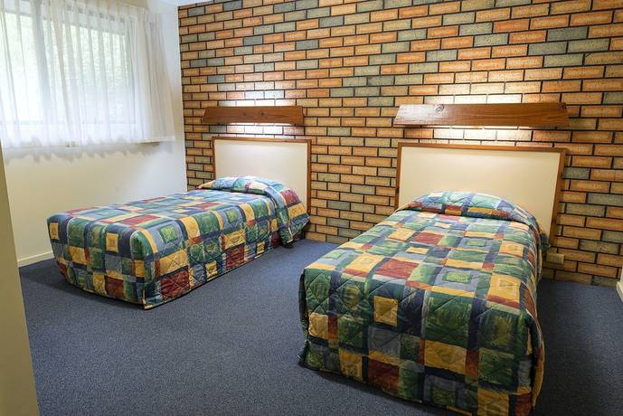 Imagen de la habitación del Hotel Pinnacle Holiday Lodge. Foto 17