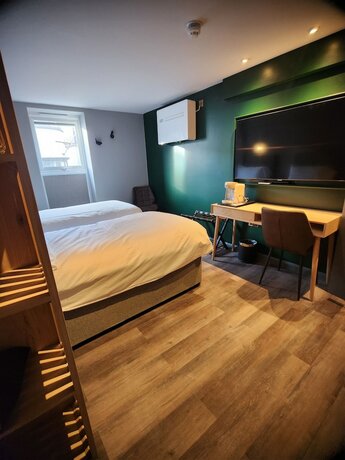 Imagen de la habitación del Hotel Pinnacle Suites, Cowes. Foto 14