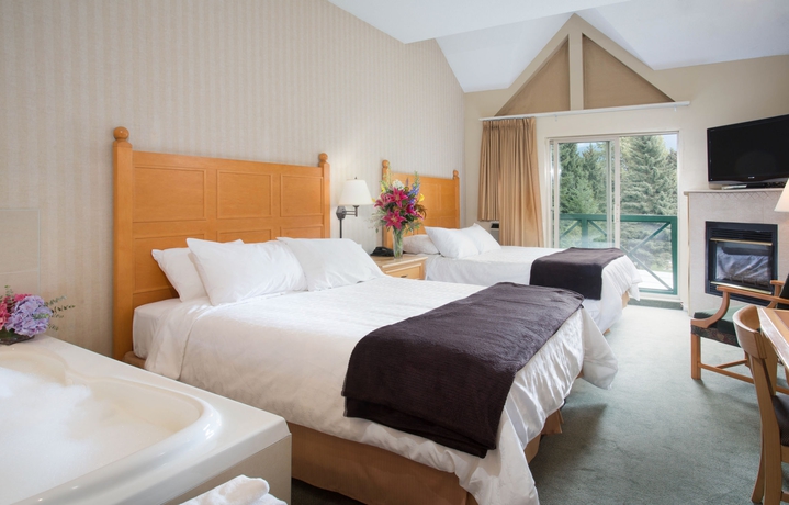 Imagen de la habitación del Hotel Pinnacle Whistler Village. Foto 7