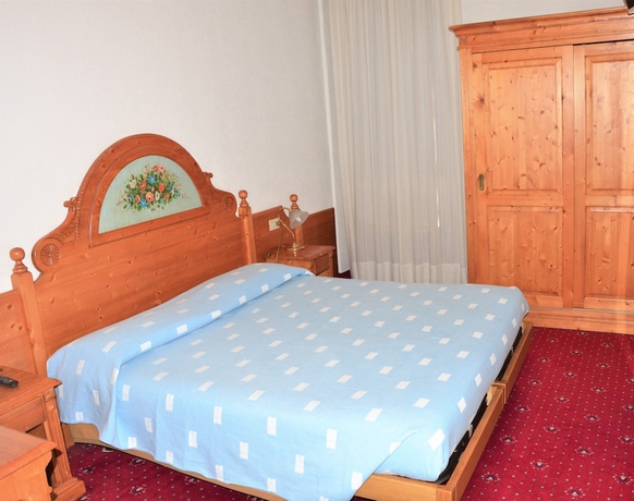 Imagen de la habitación del Hotel Pinzolo Dolomiti. Foto 9