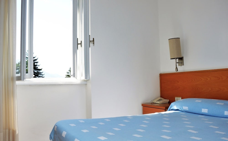 Imagen de la habitación del Hotel Pinzolo Dolomiti. Foto 10