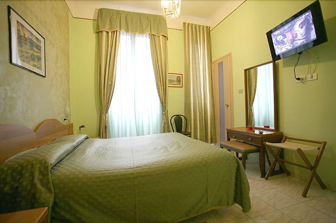 Imagen de la habitación del Hotel Piola. Foto 13