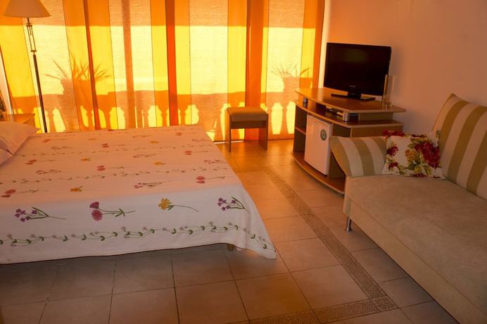 Imagen de la habitación del Hotel Pioner. Foto 19