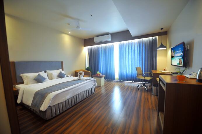 Imagen de la habitación del Hotel Pipul Padmaja Premium and Convention. Foto 16