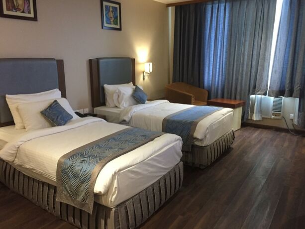 Imagen de la habitación del Hotel Pipul Padmaja Premium and Convention. Foto 19