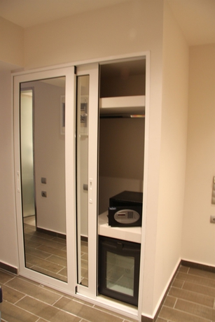 Imagen de la habitación del Hotel Piraeus City. Foto 11