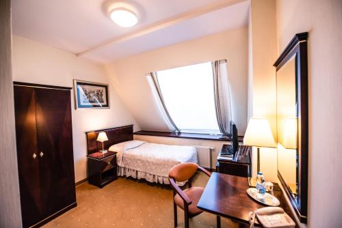 Imagen de la habitación del Hotel Piramida Park & Wellness. Foto 5