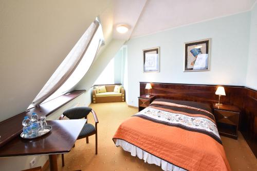 Imagen de la habitación del Hotel Piramida Park & Wellness. Foto 9